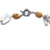 Gold Coin Pearl with Tooth Pearl - Image 3