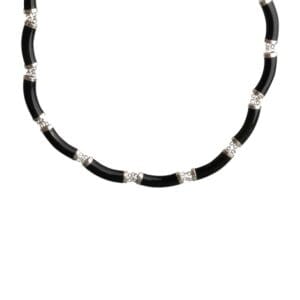 Black and silver beaded necklace on display.
