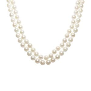 Double-strand white pearl necklace on display.