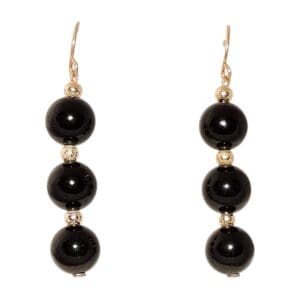 Gold hook earrings with black beads.