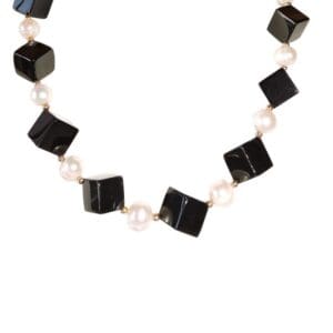 Black cube and pearl bead necklace.