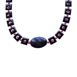 Black and red beaded necklace on display.