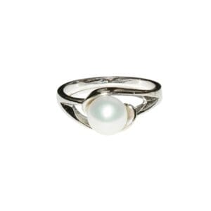 Silver ring with white pearl centerpiece.