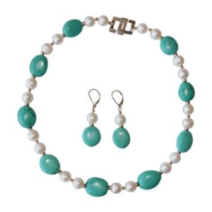 Turquoise and pearl necklace with earrings.