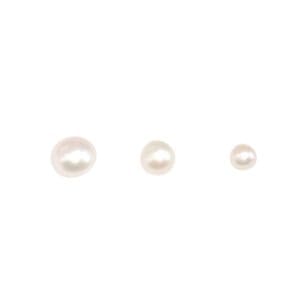 Three white pearls of varying sizes.