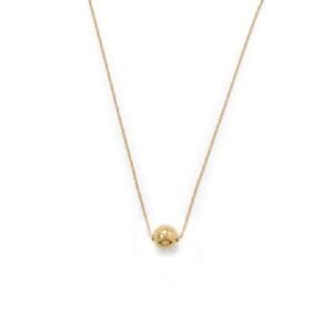 Gold necklace with small round pendant.
