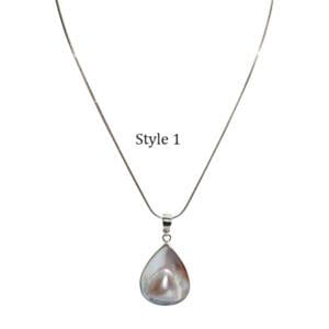 Silver necklace with teardrop pearl pendant.