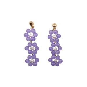 Purple beaded earrings with gold studs.