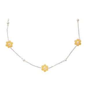 Yellow flower and pearl chain necklace.