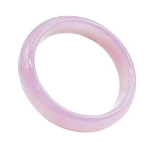 Pink jade ring with smooth finish.