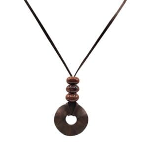 Round pendant necklace with beaded design.
