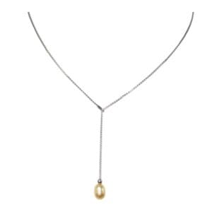 Silver necklace with single golden pearl pendant.