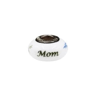 White bead with "Mom" inscription.