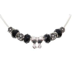 Black bead necklace with bow charm.