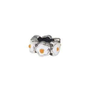 White flower charm with orange centers.