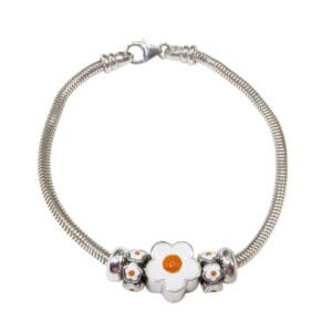 Silver bracelet with floral charm design.