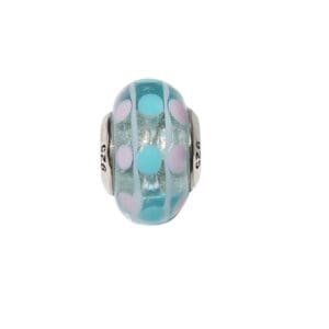 Colorful glass bead with polka dots.