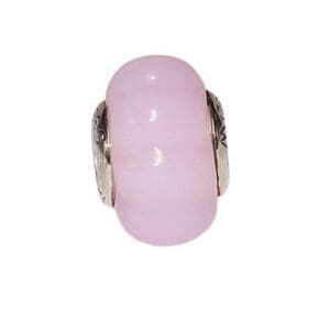Pink glass bead with silver accents.