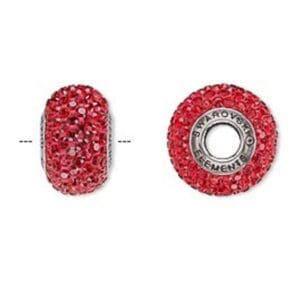 Red Swarovski crystal bead, side and top views.