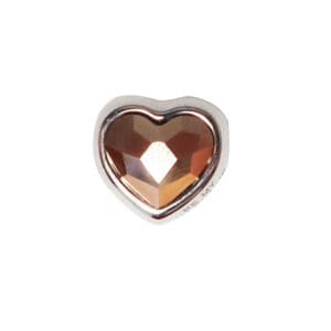 Heart-shaped, brown gemstone in silver setting.