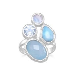 Silver ring with blue and clear gemstones.