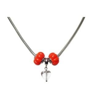 Necklace with red beads and heart pendant.