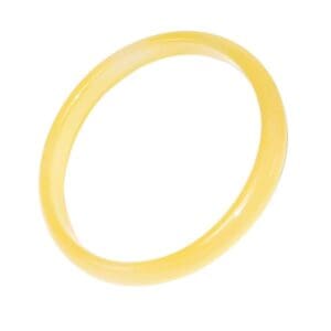 Yellow jade bangle on white background.