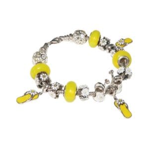 Silver bracelet with yellow charms and beads.