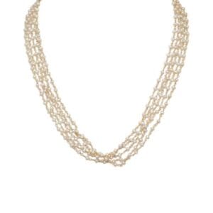 Layered pearl necklace on white background.