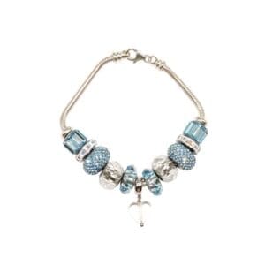 The Aqua Marine Crystal Bracelet is a silver piece with blue and clear beads, featuring a heart-shaped charm and a lobster clasp.