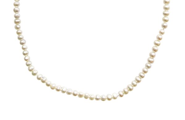 The Little Girl Pearl Necklace features a consistent row of white pearls strung elegantly with a straightforward clasp.