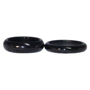 Two black ceramic rings on display.