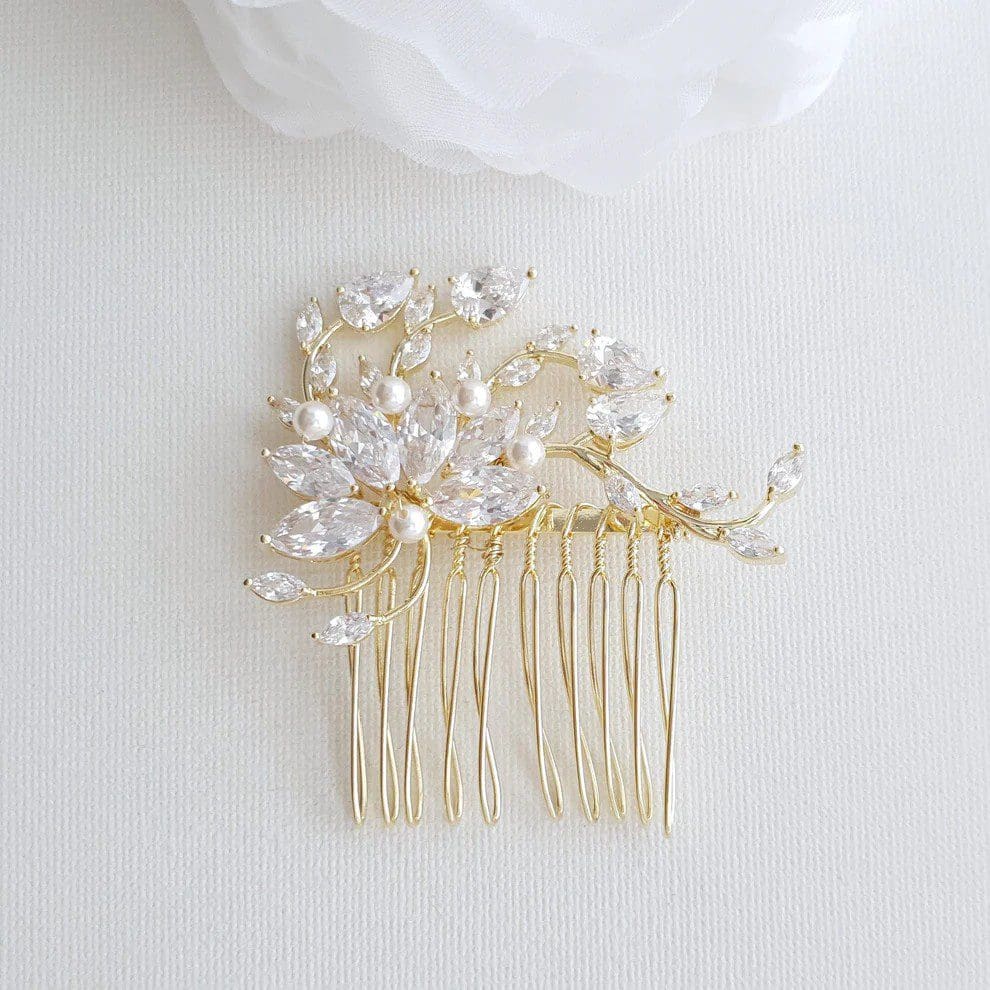 Gold hair comb with pearls and crystals.