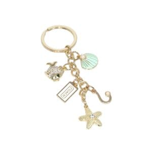 Coach tag keychain with mint shell charm