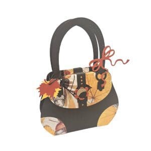 Decorative handbag with autumn-themed design.