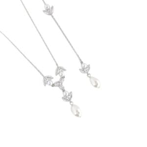 Silver necklaces with pearls and leaf designs.