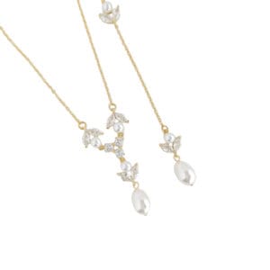 Gold necklace with pearls and leaf design.