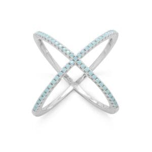 Silver crisscross ring with turquoise gemstones.