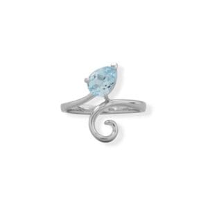Silver ring with blue gemstone swirl design.