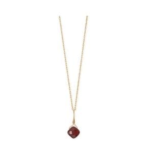 Gold chain with red gemstone pendant.